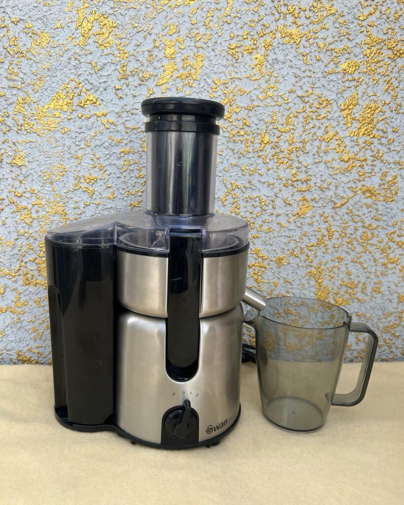 Adjustable Measuring Swan juice extractor